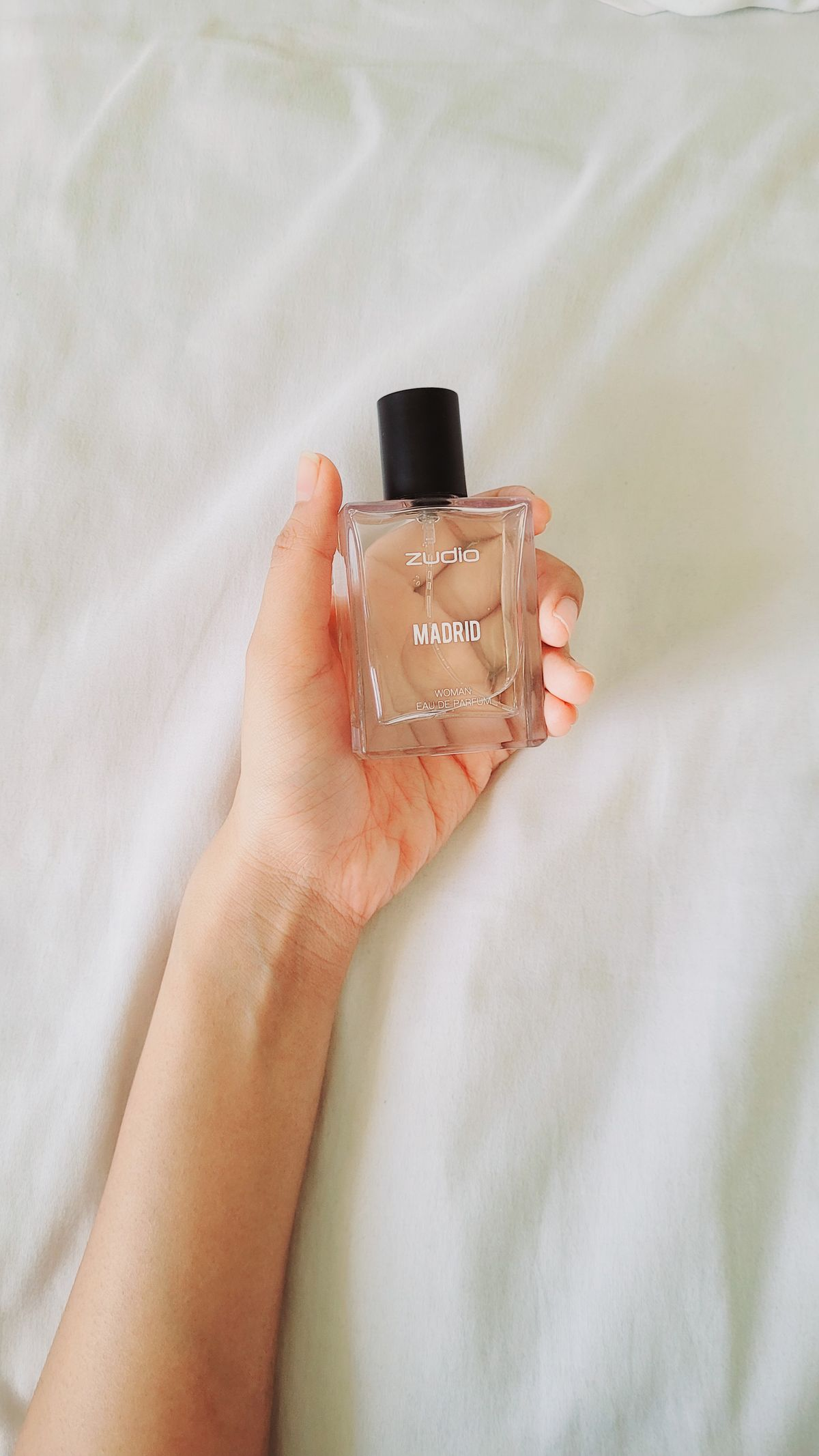 Dior Sauvage Elixir decant in a glass bottle